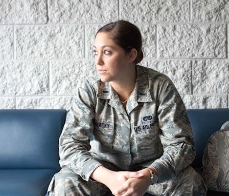 Air Force nurse sitting on bench