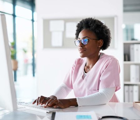 Nurse working on computer